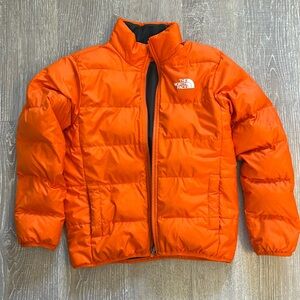 Reversible North Face Puffer. Orange or Gray. Size medium 8/10. Good condition.